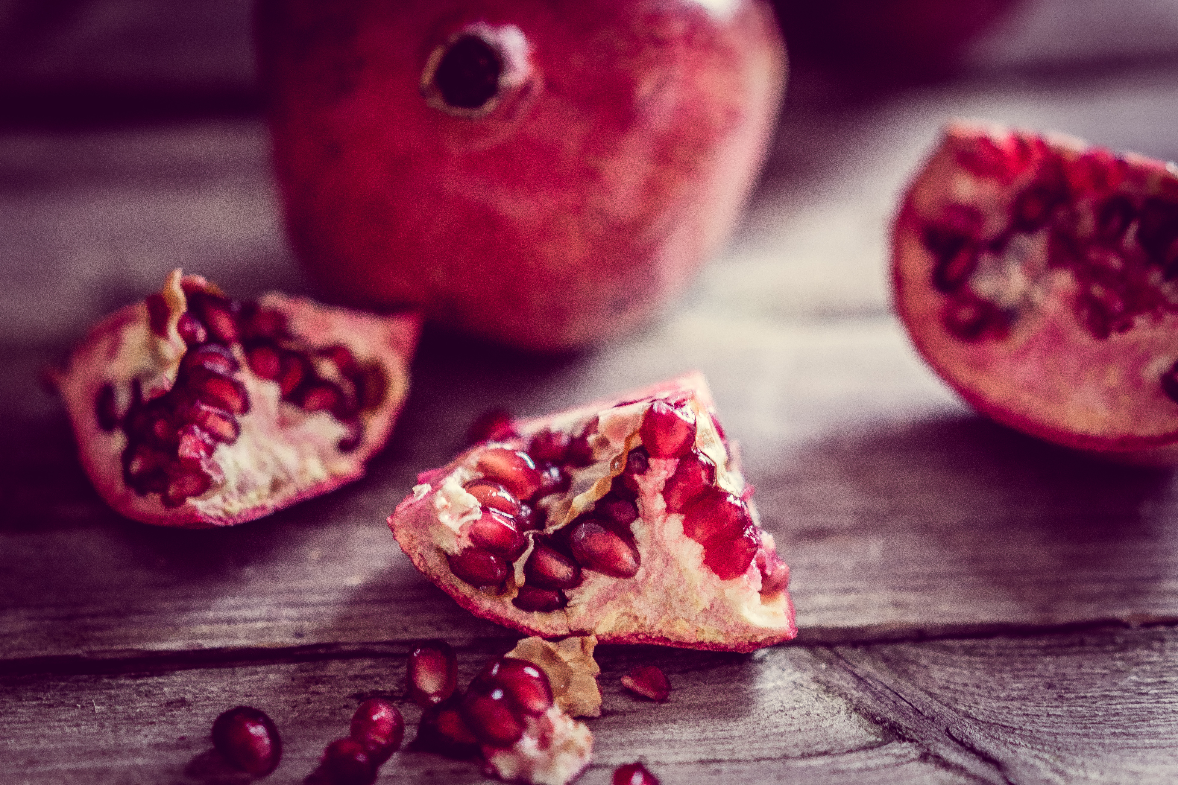 Pomegranate on wooden background